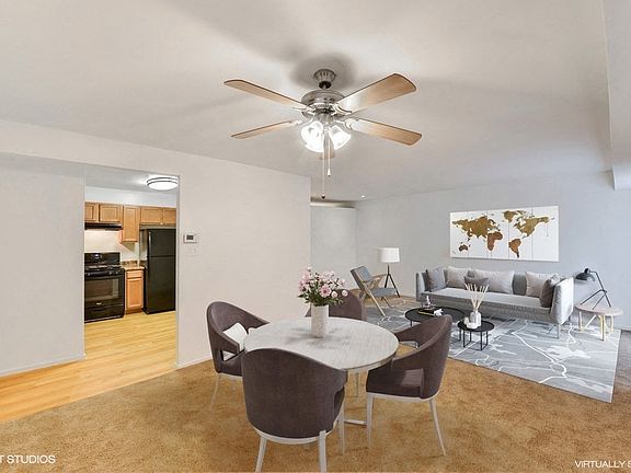 Separate Dining Area with Lighted Ceiling Fan