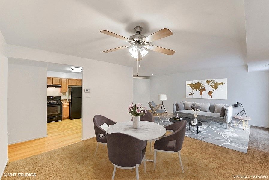Separate Dining Area with Lighted Ceiling Fan