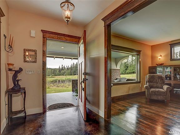 Craftsman style window and door casings compliment the large openings and windows throughout the home.  