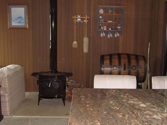 Adjacent to kitchen is small area that could be informal eating. Currently, the barrel opens up to s