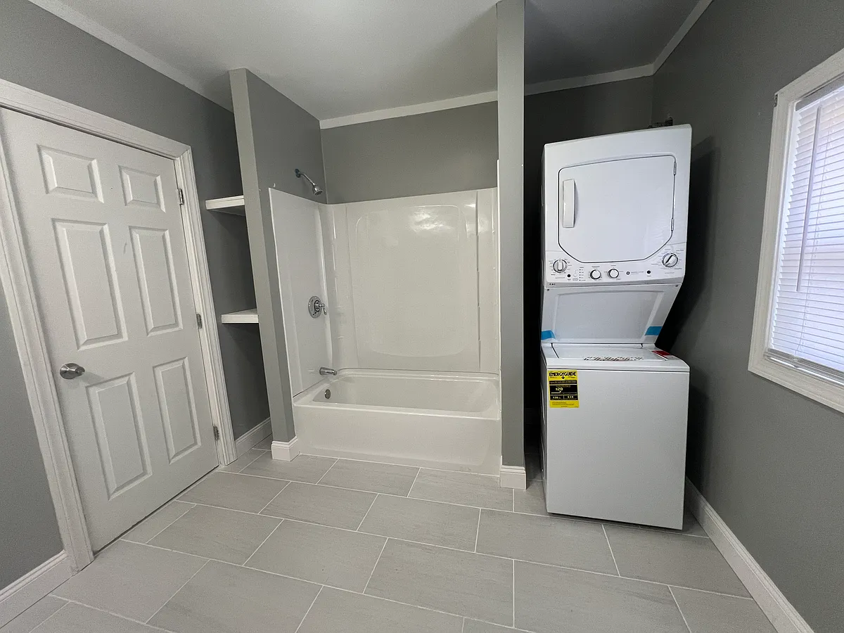 Newly renovated bathroom with new washer/dryer and shower - 1608 Chalkstone Ave #2