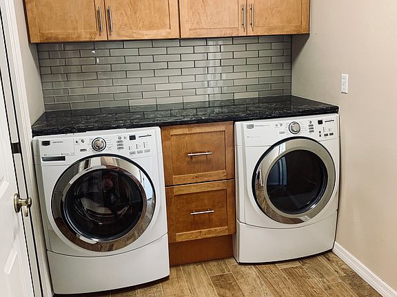 Laundry room & large pantry.