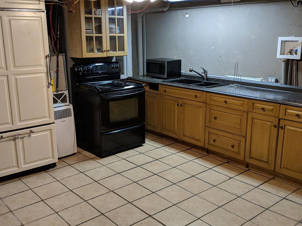 Kitchen with SubZero Refrigerator - Same space as Livingroom
