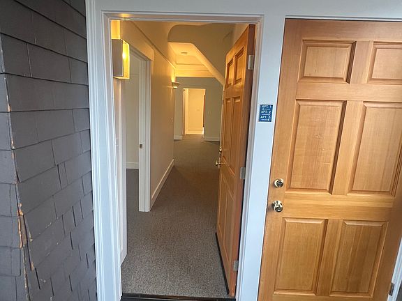 Entrance to 1 First Floor. Door to the right goes upstairs to two units.