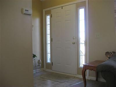 Foyer with Upgraded Sidelight Windows & Guest Coat Closet!