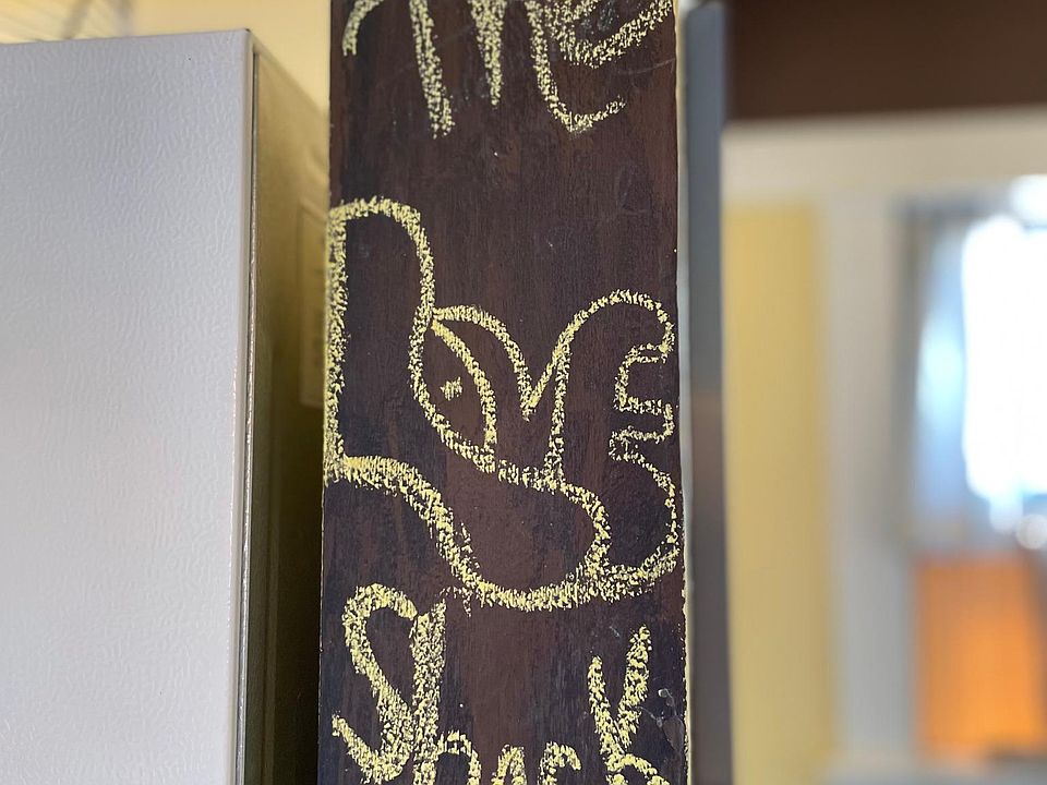 Chalkboard paint in the kitchen let_s you keep notes, make lists or just get artsy!