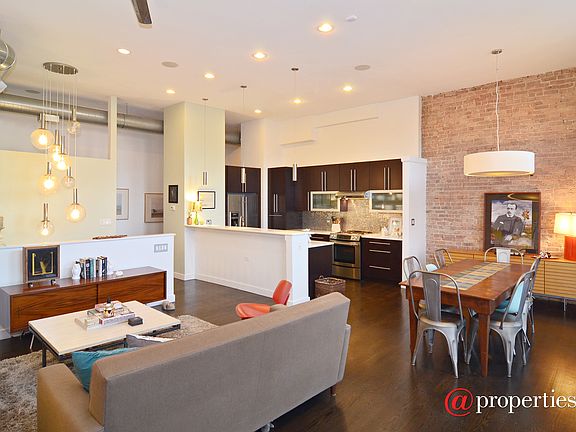 Gracious living/dining space with cool loft feel