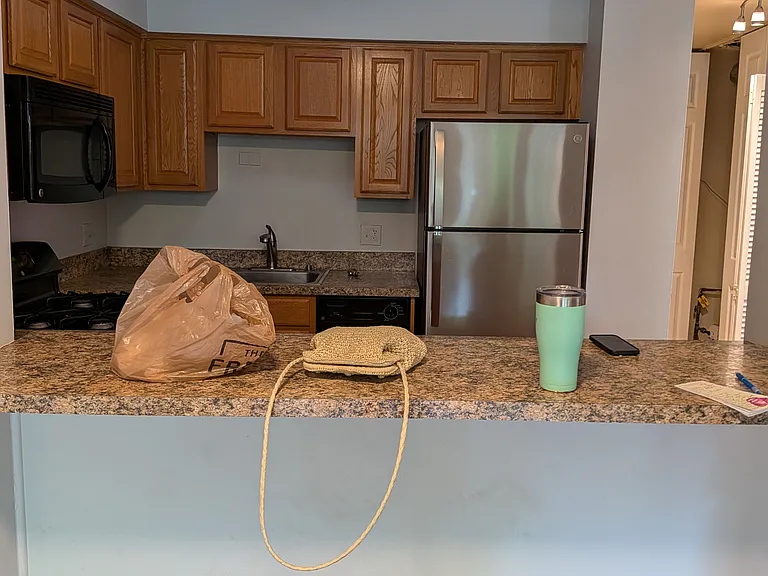 View of kitchen from living area