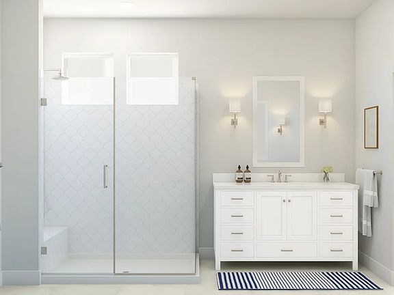 Primary bath with glass shower enclosure