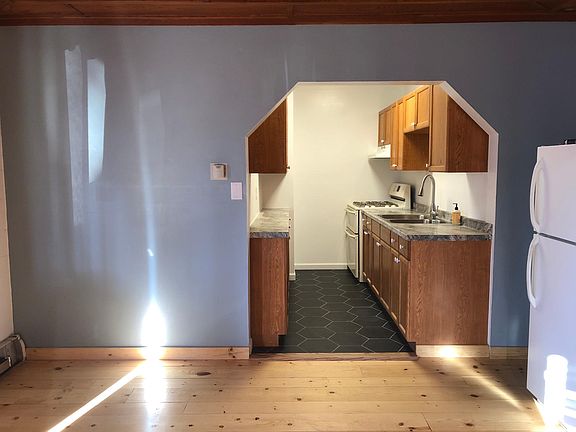 Brand new kitchen counters, sink, and floor tile.