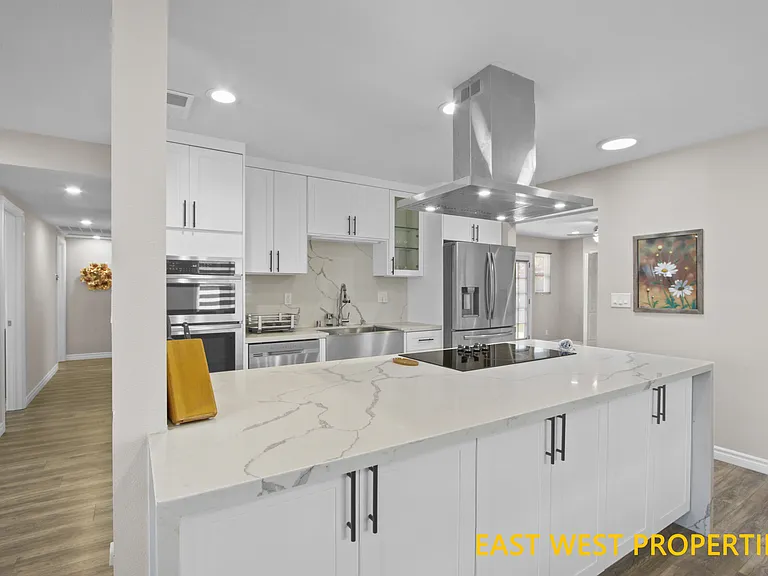 6942 Santa Rita Ave — Photo 2