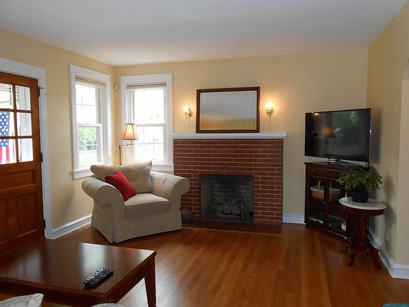 Living Room With Brick Fire Place