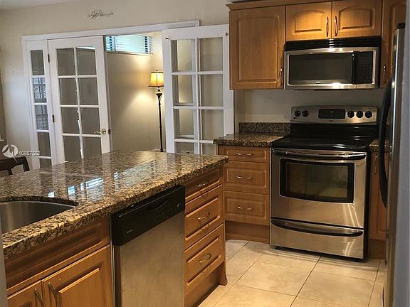 4th image of 15001 Royal Palm Ct #15001