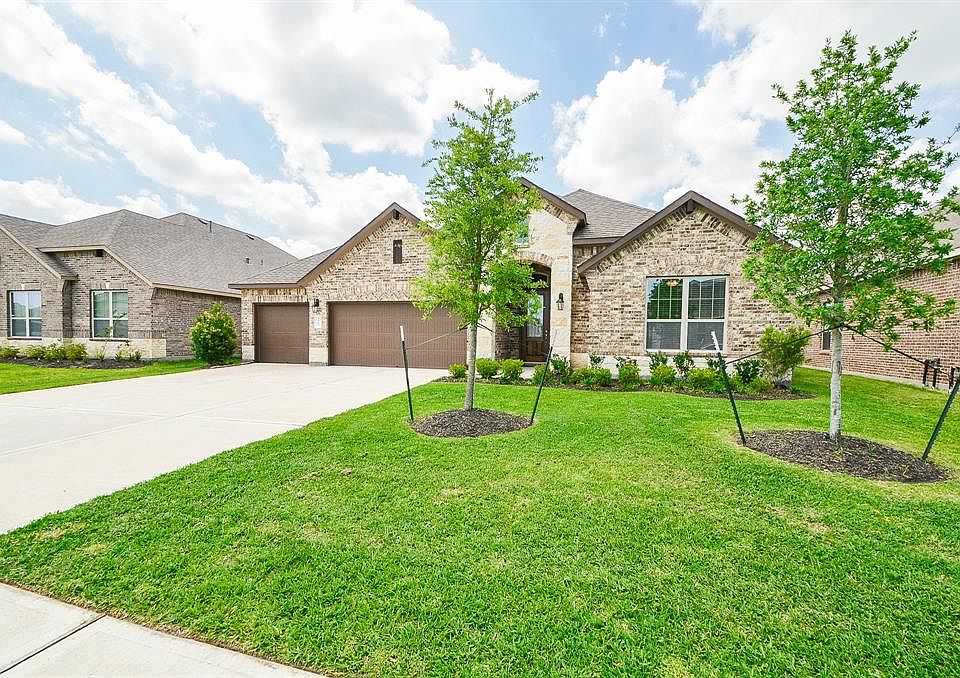 Curb appeal galore! Immaculate landscaping and mature trees give this charming home a welcoming feel from the moment you pull up.