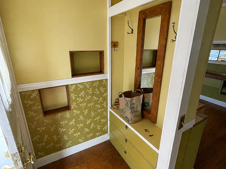 Entry hall with original built-in details