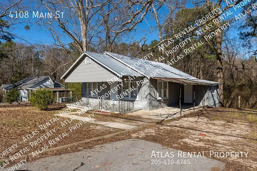 Cozy 2BR Home with Modern Amenities & Inviting Front Porch! — Photo 2
