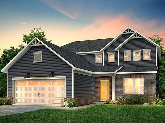 Hartwell Exterior CR105 features siding, brick, covered front door and 2 car garage