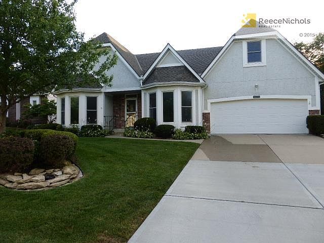 Low maintenance stucco and Vinyl ext, beautiful landscaping!