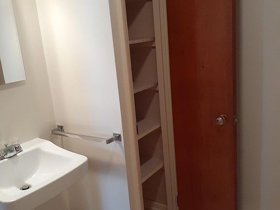 Bathroom with linen closet