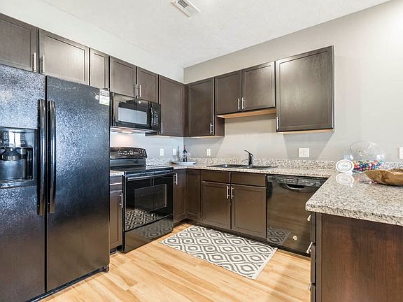 Our large kitchens feature granite countertops, modern hardware and ample storage.