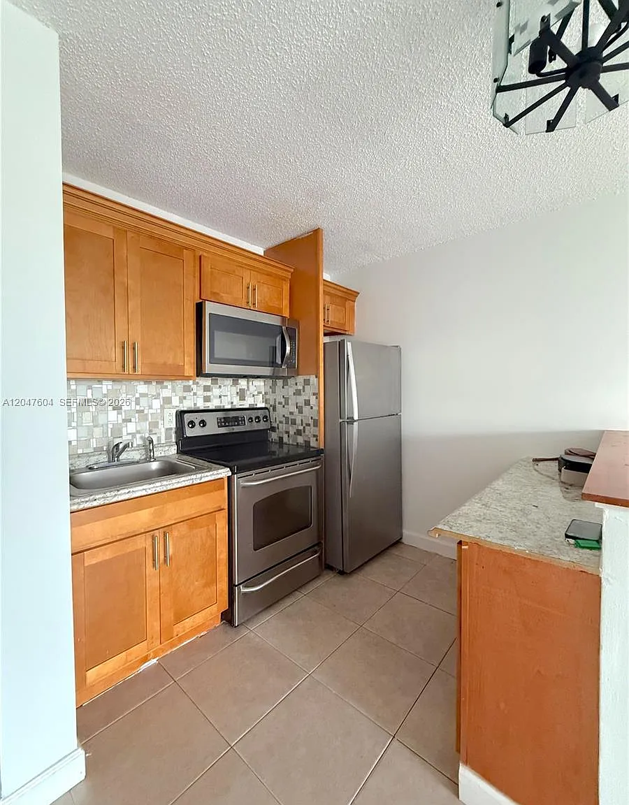 Saga Bay Gardens Condo — Photo 1