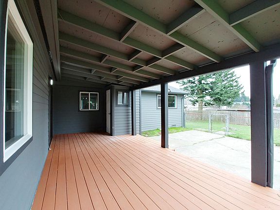 Large covered deck and patio. There's even a 1/2 bathroom on
