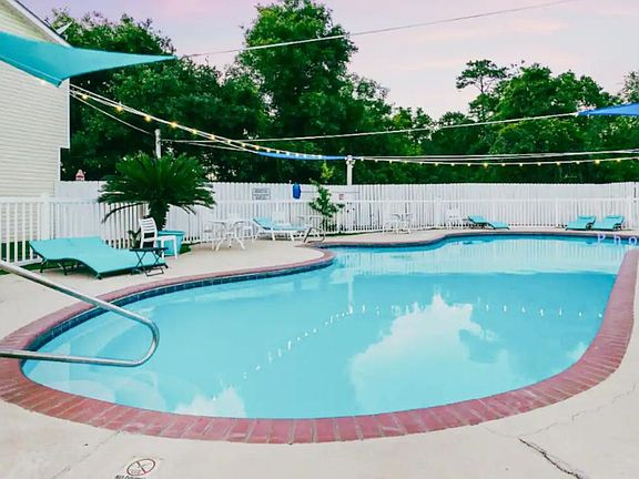 Whether you choose to swim, float, or simply bask in the sun's warmth on a lounge chair, the sparkling blue pool offers a blissful escape from the outside world.