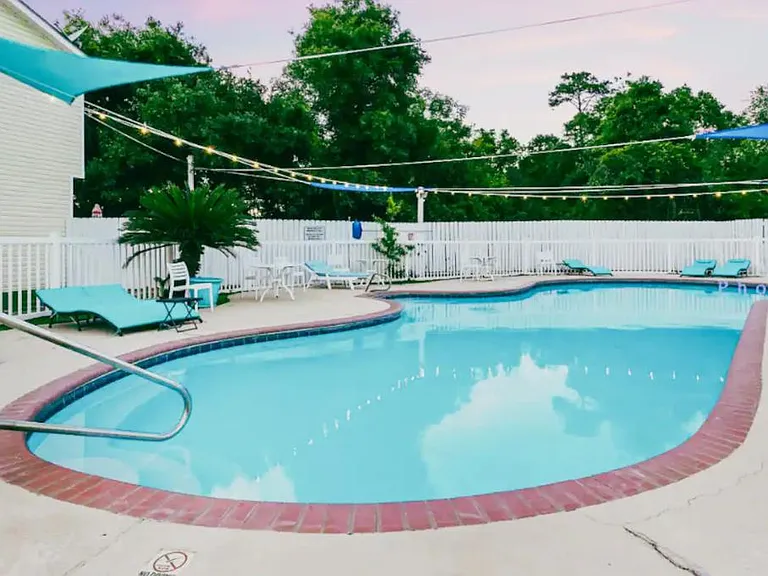 Whether you choose to swim, float, or simply bask in the sun's warmth on a lounge chair, the sparkling blue pool offers a blissful escape from the outside world.