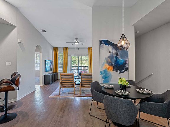 Separate dining areas and breakfast bar offer plenty of seating or entertainment space