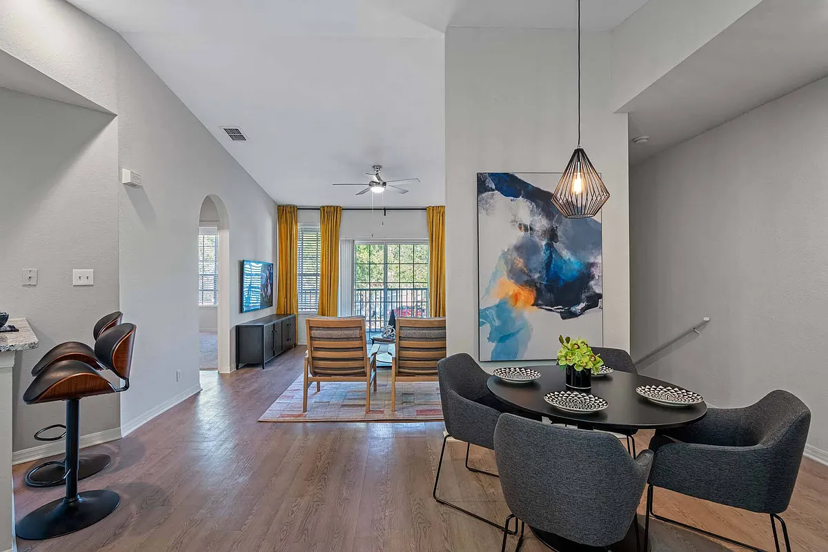 Separate dining areas and breakfast bar offer plenty of seating or entertainment space - Windsor Highwoods Preserve