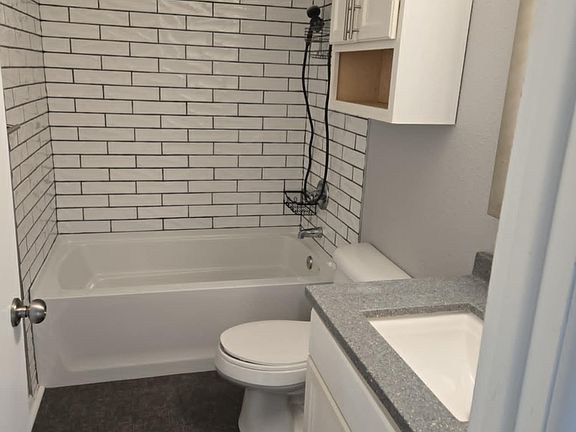 Tile shower/tub combination.
