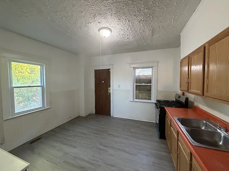 2958 East 71st Street - Front Left — Photo 15