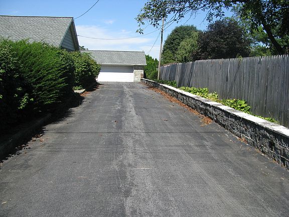 Driveway off Adams St leading to detached 2 car garage