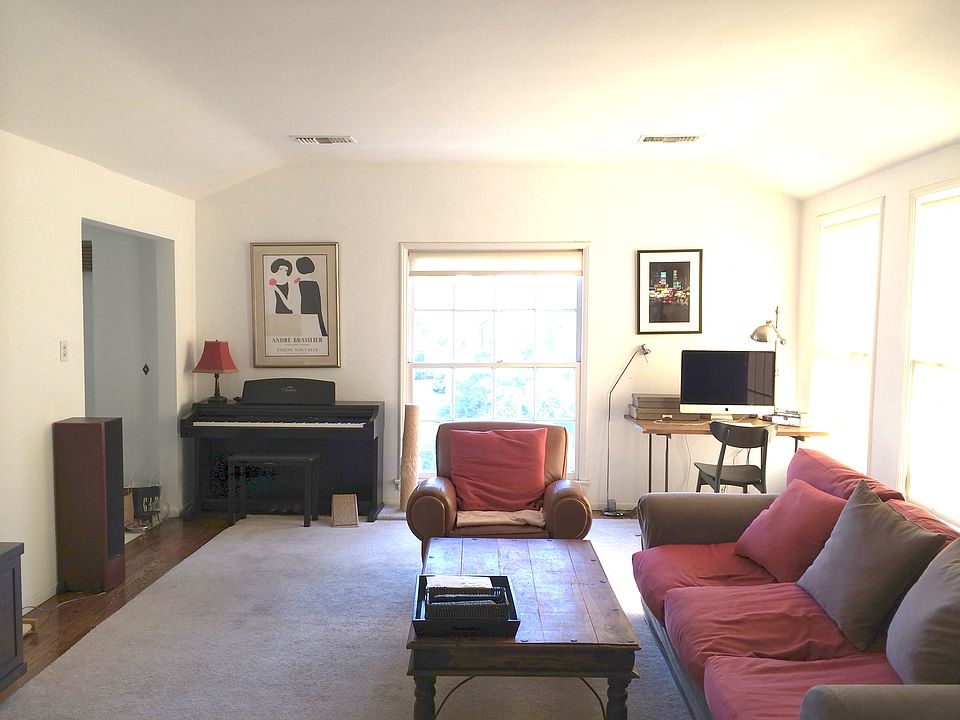Living room - doorway to left leads to stairs to front door.
