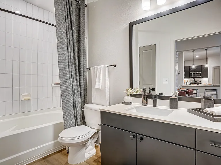 Bathroom with Quartz Countertop and Soaking Tub
