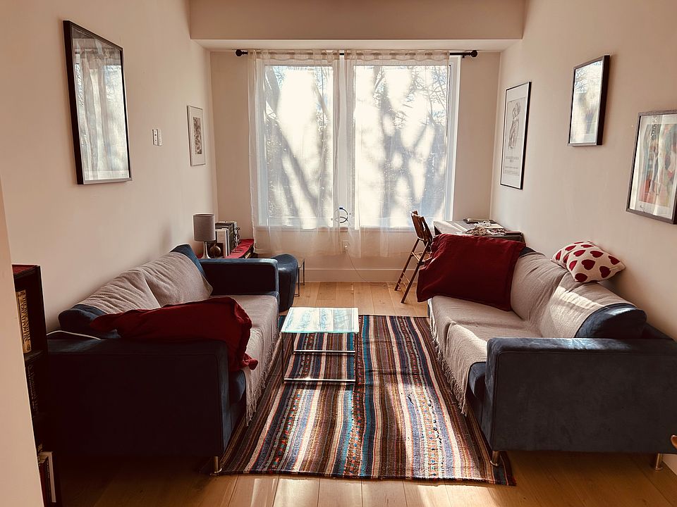 Living/dining area is drenched in light.