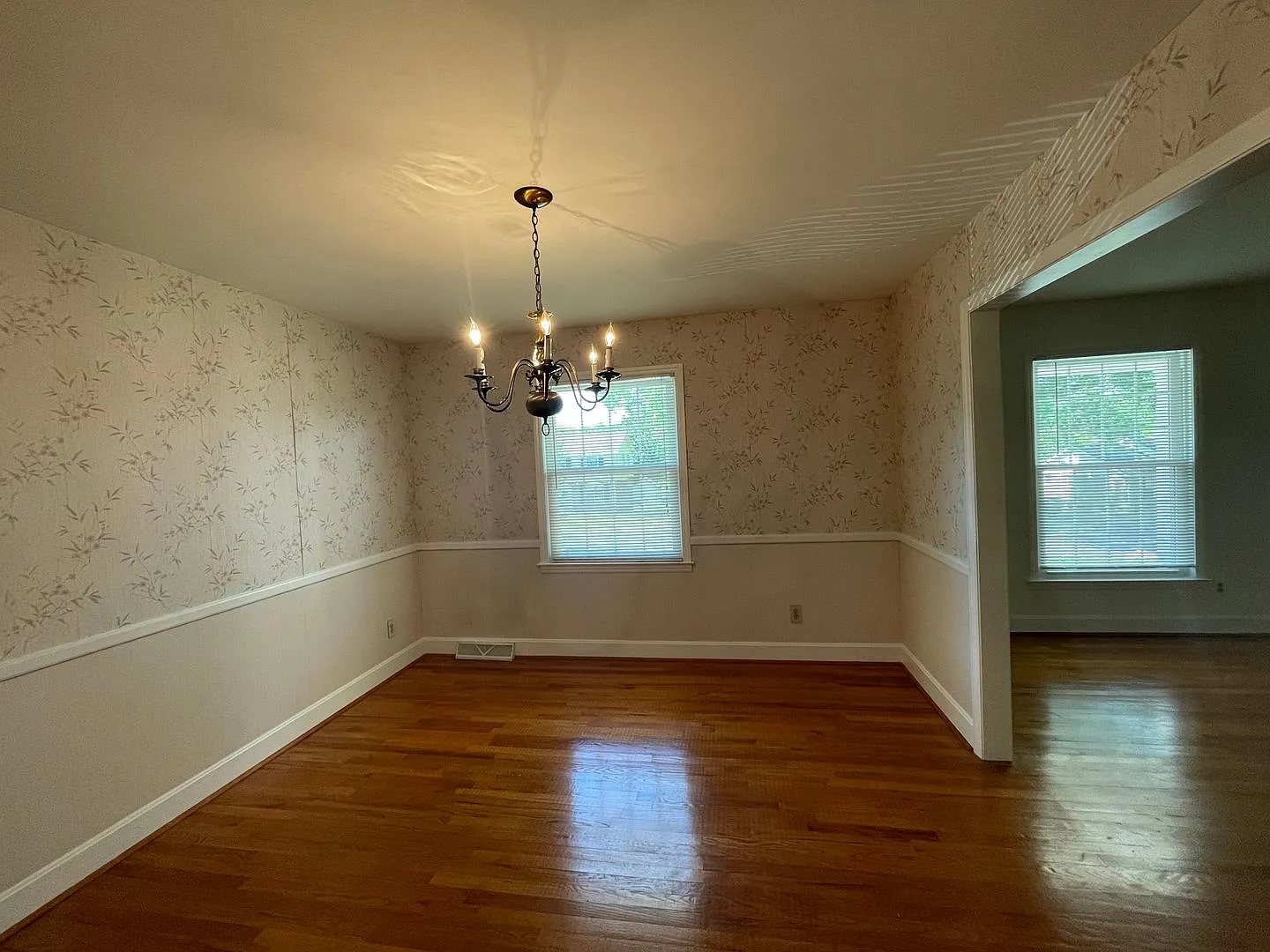 Elegant Brick Ranch with Updated Interiors & Backyard Deck — Photo 4