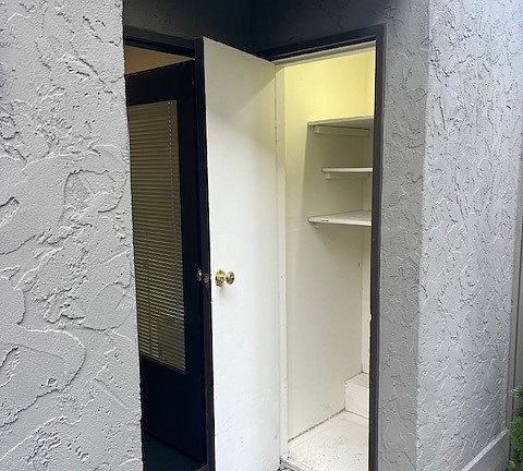 Entry with exterior storage closet