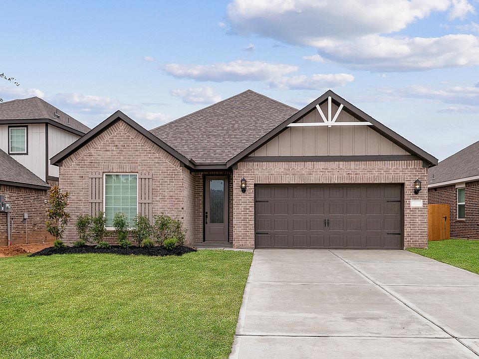 The Falls plan is a spacious single-story brick home