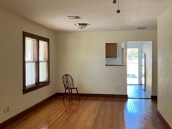 LivingRoom opens to kitchen and the backyard