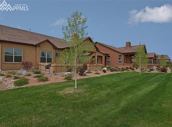 Private Patio with views of open space.  Superior exterior maintenance