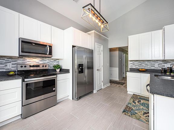 Updated kitchen with stainless steel appliances
