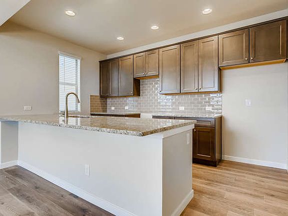 Stainless steel appliances (fridge, range, microwave and DW) are included but not pictured.