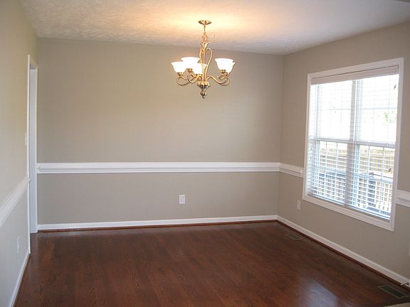 FORMAL DINING ROOM WITH HARDWOOD FLOOR