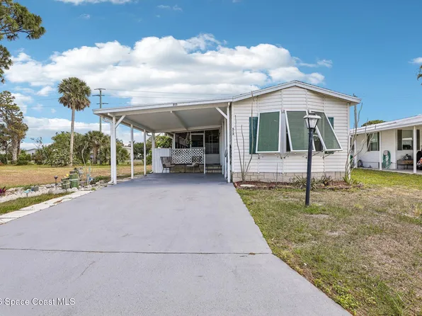 513 Egret Cir, Barefoot Bay, FL 32976