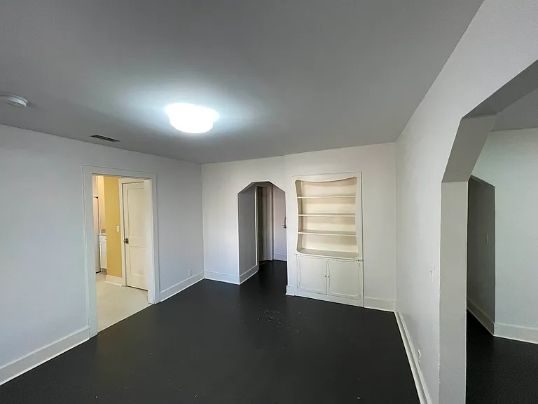 Dining room with built-in bookcase/cabinet.