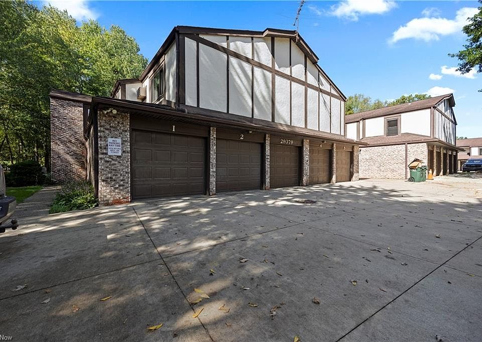 front of building shows attached garage