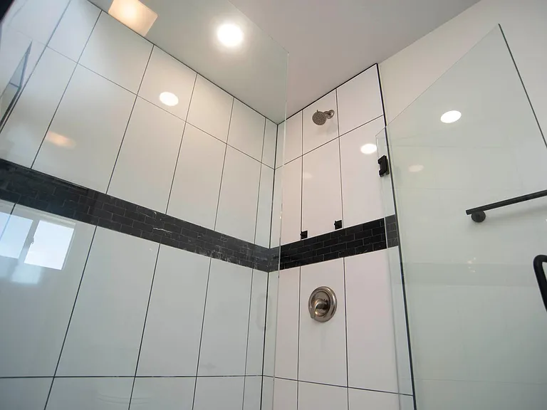 Large bedroom ensuite bathroom with walk-in shower