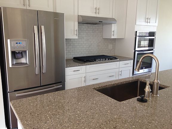 Gourmet kitchen with quartz countertops