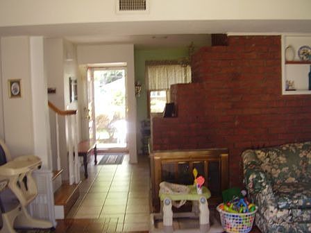 View of Foyer/Fireplace from Living Room